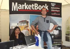 Debie Biharie with an enthusiastic visitor at MarketBook.