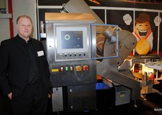 Kees Kelders van Insort. Trots op het winnen van de Food Innovation Award 2015 met de Sherlock Food Analyser. Deze machine voert metingen uit gebaseerd op de droge stoffen van een aardappel in dit geval. Hiermee krijg je een verbeterd overzicht van de kwaliteit van het product.