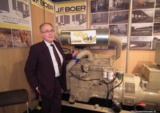 100 jaar Boer Berkel! Hans Boer bij het feestlogo