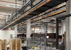 In het nieuwe pand wordt het magazijnproces verregaand geautomatiseerd in samenwerking met Vanderlande.